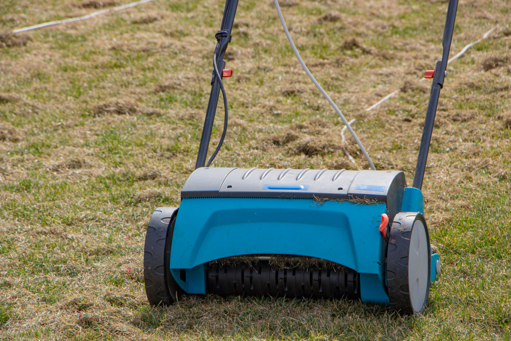 A photo of a plug aerator on a lawn